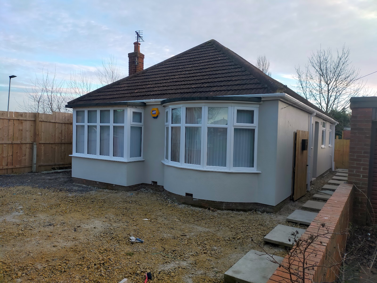 A bungalow in the North East with a fresh cream render finished by TW Plastering